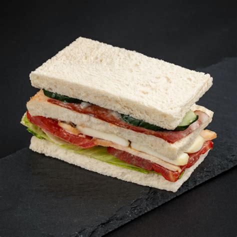 How does Club Sandwich - Half Order fit into your Daily Goals - calories, carbs, nutrition