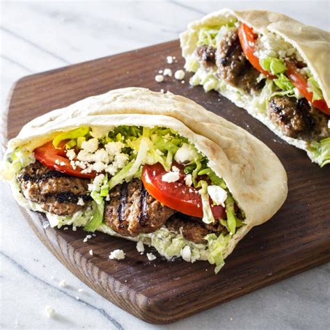 How does Combo Grilled Lamb Pita Greek Potatoes & Aioli Tzatziki & Greek Salad fit into your Daily Goals - calories, carbs, nutrition