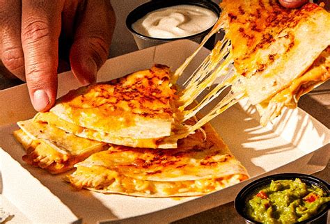 How does Cosmic Cantina Chicken Quesadilla fit into your Daily Goals - calories, carbs, nutrition