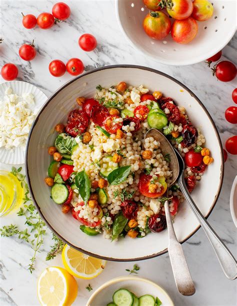 How does Couscous, Tomato & Olive Salad fit into your Daily Goals - calories, carbs, nutrition