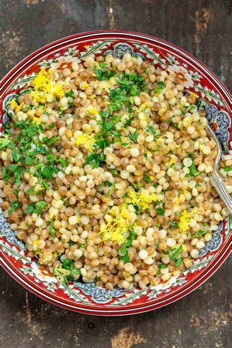 How does Couscous Israeli Steamed 1/2 Cup fit into your Daily Goals - calories, carbs, nutrition