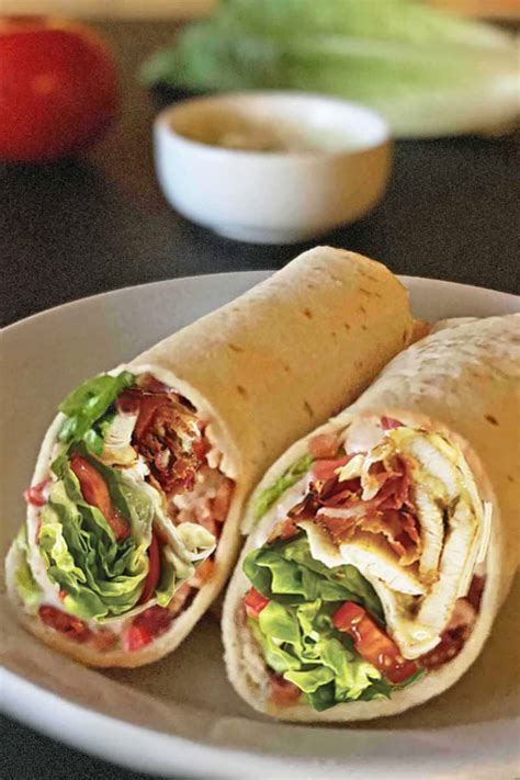 How does Crispy Chicken, Bacon Cheese Wrap withSide Salad fit into your Daily Goals - calories, carbs, nutrition