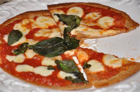 How does Crispy Thin Crust Margherita Pizza fit into your Daily Goals - calories, carbs, nutrition