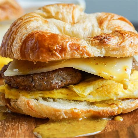 How does Croissant with Eggs, Cheese & Sausage fit into your Daily Goals - calories, carbs, nutrition