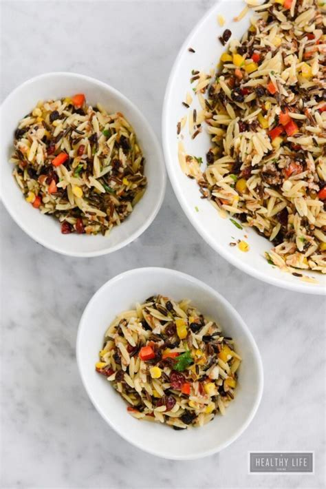 How does Cumin Orzo Wild Rice Salad fit into your Daily Goals - calories, carbs, nutrition