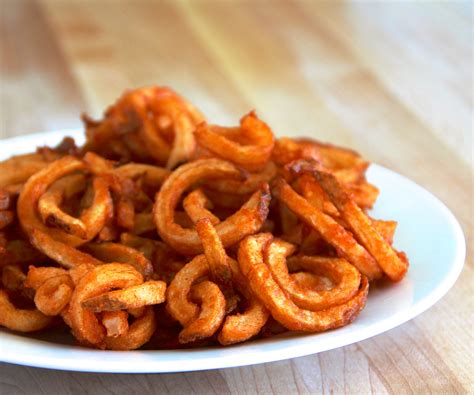 How does Curly French Fries fit into your Daily Goals - calories, carbs, nutrition