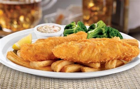 How does DENNY'S, fish fillet, battered or breaded, fried fit into your Daily Goals - calories, carbs, nutrition