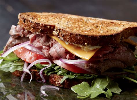 How does Dijon Roast Beef Sandwich, 1-1/2 meat oz fit into your Daily Goals - calories, carbs, nutrition