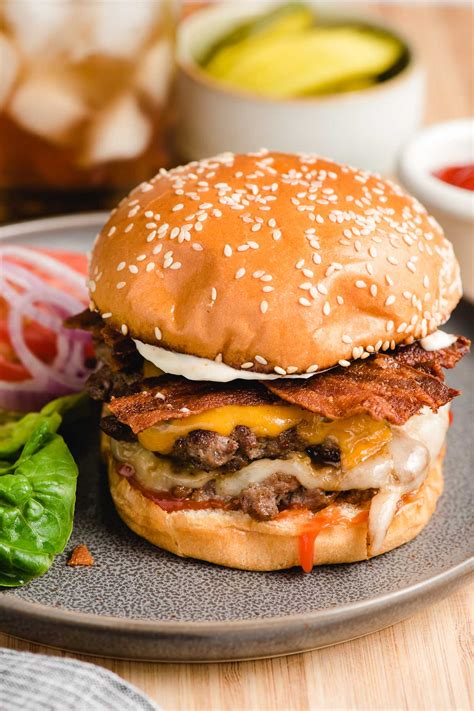 How does Double Bacon Cheddar Burger fit into your Daily Goals - calories, carbs, nutrition