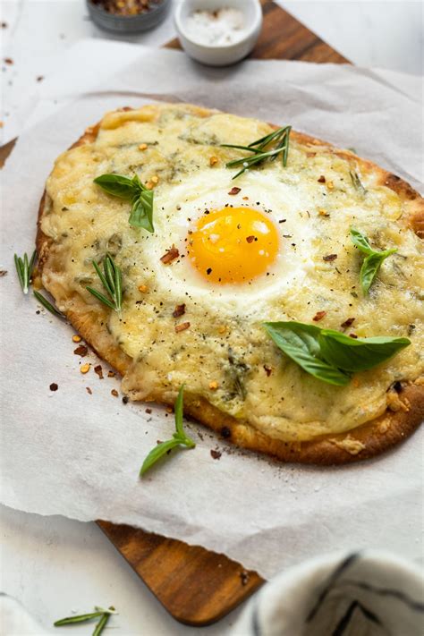 How does Egg Breakfast Flatbread Pizza fit into your Daily Goals - calories, carbs, nutrition