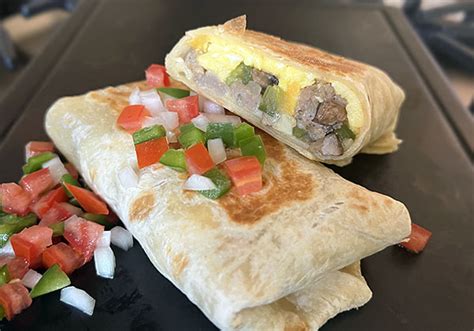 How does Egg Sausage and Cheese Morning Wrap fit into your Daily Goals - calories, carbs, nutrition