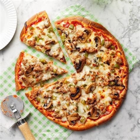 How does Egg Turkey Sausage Pizza fit into your Daily Goals - calories, carbs, nutrition