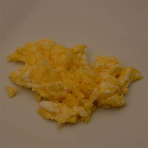 How does Eggs Chol Free Scrambled 1/2 Cup fit into your Daily Goals - calories, carbs, nutrition