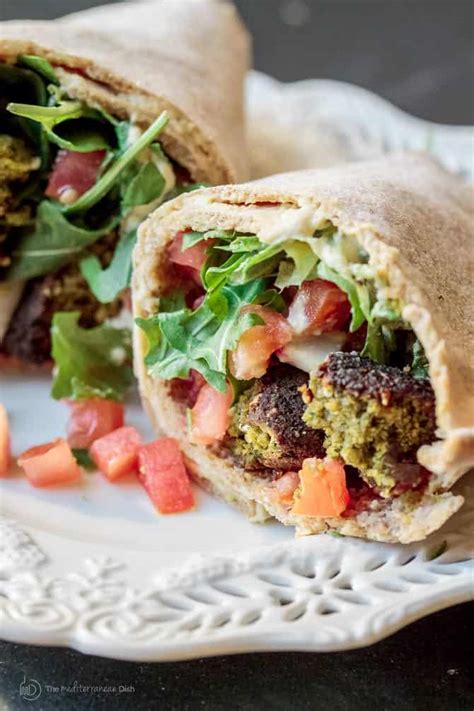 How does Express Falafel & Tomato Tzatziki Wrap fit into your Daily Goals - calories, carbs, nutrition