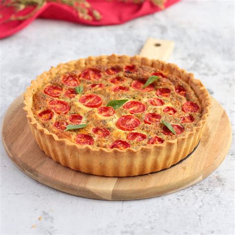 How does Ez Quiche - Tomato and Mozzarella Cheese fit into your Daily Goals - calories, carbs, nutrition