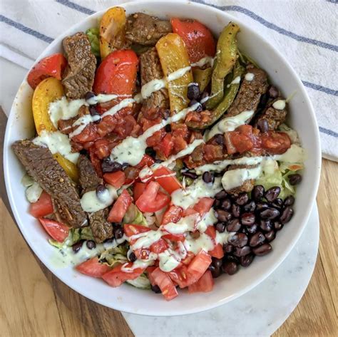 How does Fajita Steak Salad Plate fit into your Daily Goals - calories, carbs, nutrition