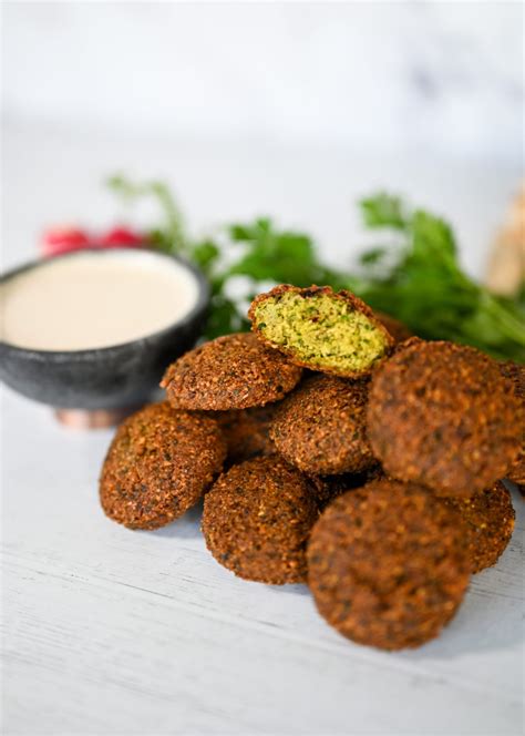 How does Falafel Balls in Warm Lebanese Flatbread fit into your Daily Goals - calories, carbs, nutrition