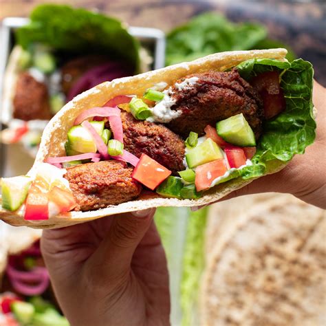 How does Falafel Pita Sandwich with Tzatziki fit into your Daily Goals - calories, carbs, nutrition