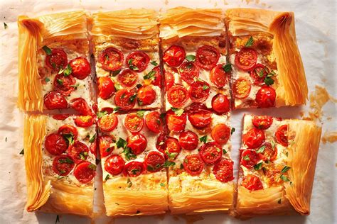 How does Filo Tart with Cherry Tomatoes, Feta and Basil fit into your Daily Goals - calories, carbs, nutrition