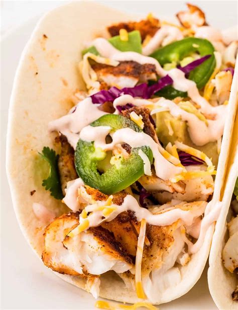 How does Fish Taco on White Tortilla fit into your Daily Goals - calories, carbs, nutrition