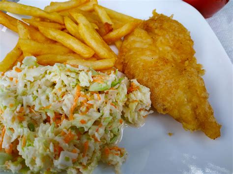 How does Fish and Chips with fries and cole slaw fit into your Daily Goals - calories, carbs, nutrition