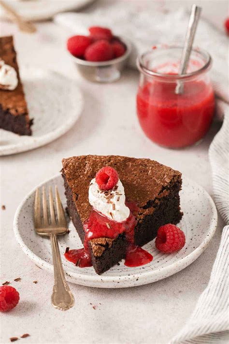 How does Flourless Chocolate Torte with Fruit Compote and Vanilla Sauce fit into your Daily Goals - calories, carbs, nutrition