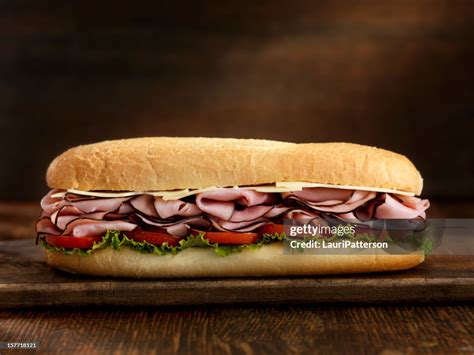 How does Footlong Ham Turkey with Swiss Cheese Sub fit into your Daily Goals - calories, carbs, nutrition