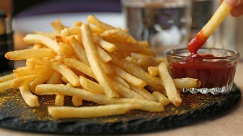 How does French Fries with Ketchup fit into your Daily Goals - calories, carbs, nutrition