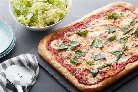 How does Fresh Mozzarella and Basil Pizza fit into your Daily Goals - calories, carbs, nutrition