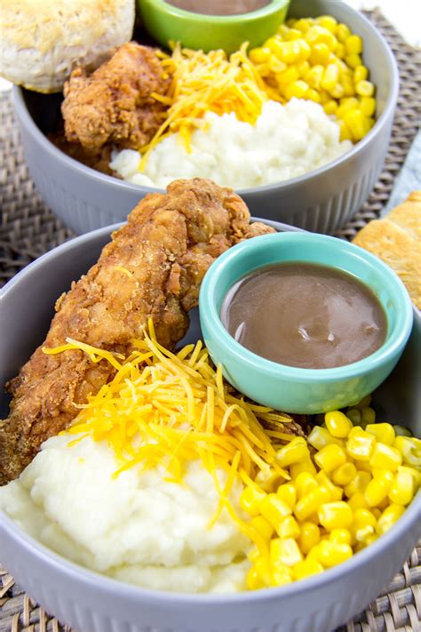 How does Fried Chicken and Mashed Potato Bowl with Corn and Gravy fit into your Daily Goals - calories, carbs, nutrition