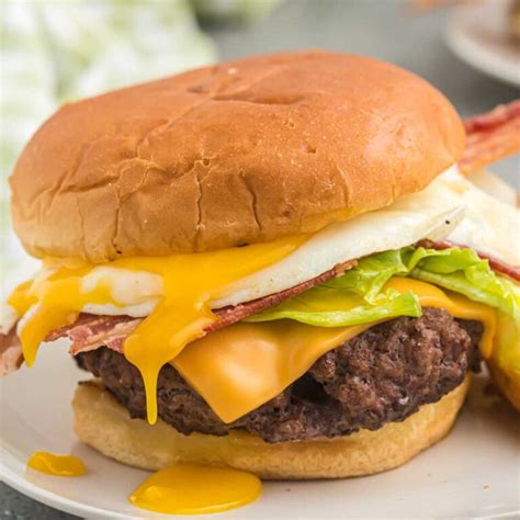 How does Fried Egg Cheeseburger fit into your Daily Goals - calories, carbs, nutrition