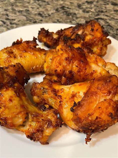 How does Garlic Chicken Wings fit into your Daily Goals - calories, carbs, nutrition