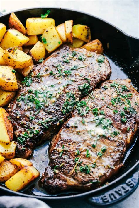 How does Garlic Roasted Sirloin with Chimchurri Sauce, with Roasted Cauliflower Herb Roasted red Bliss Potatoes fit into your Daily Goals - calories, carbs, nutrition