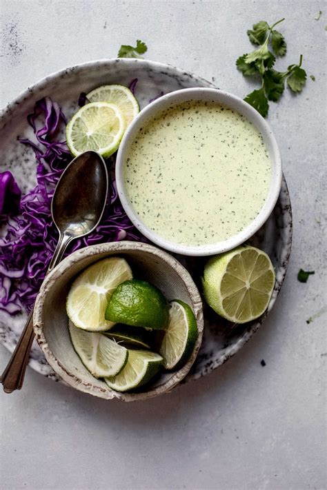 How does Garlic-Lime and Cilantro Crema fit into your Daily Goals - calories, carbs, nutrition