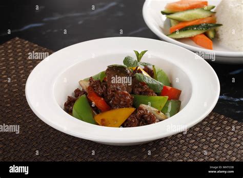 How does Ginger-Pepper Beef over Steamed Rice fit into your Daily Goals - calories, carbs, nutrition