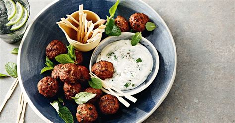 How does Greek Style Lamb Meatballs with Minted Yoghurt in a Sub Roll fit into your Daily Goals - calories, carbs, nutrition