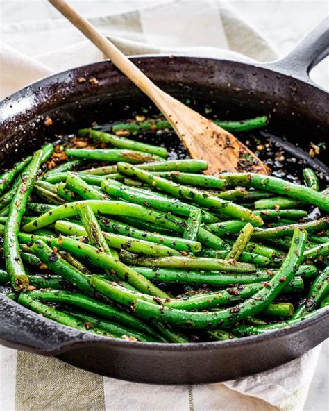 How does Green Beans Fresh Sauteed Lemon Garlic 1 oz fit into your Daily Goals - calories, carbs, nutrition