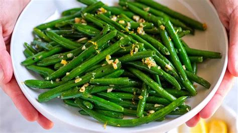 How does Green Beans Fresh Sauteed Lemon Garlic 4 oz fit into your Daily Goals - calories, carbs, nutrition