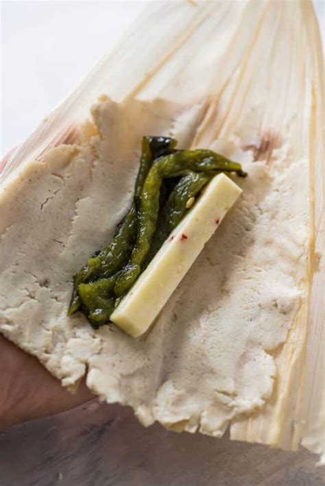 How does Green Chile and Cheese Tamale fit into your Daily Goals - calories, carbs, nutrition