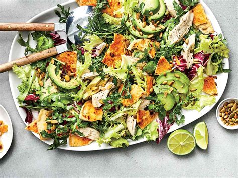 How does Greens Salad with Chicken Avocado - Half Order fit into your Daily Goals - calories, carbs, nutrition