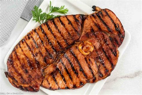 How does Griddled Ham Steak (1) fit into your Daily Goals - calories, carbs, nutrition