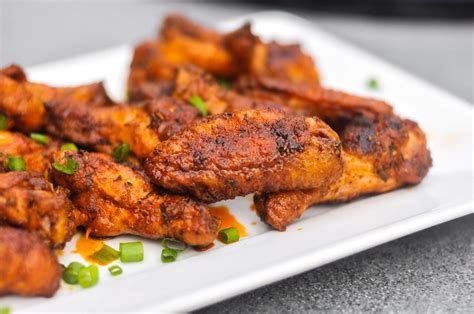 How does Grilled Cajun BBQ Chicken Wings fit into your Daily Goals - calories, carbs, nutrition