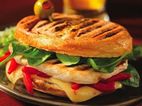 How does Grilled Chicken, Spinach, Roasted Red Pepper and Pepper-Jack Panini fit into your Daily Goals - calories, carbs, nutrition