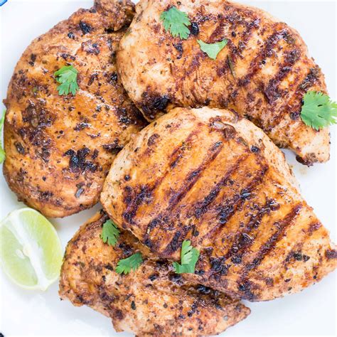 How does Grilled Chicken Breast, Marinated, Grilled fit into your Daily Goals - calories, carbs, nutrition