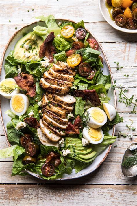 How does Grilled Chicken Cobb Salad (Half) fit into your Daily Goals - calories, carbs, nutrition