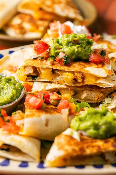 How does Grilled Chicken Quesadilla fit into your Daily Goals - calories, carbs, nutrition