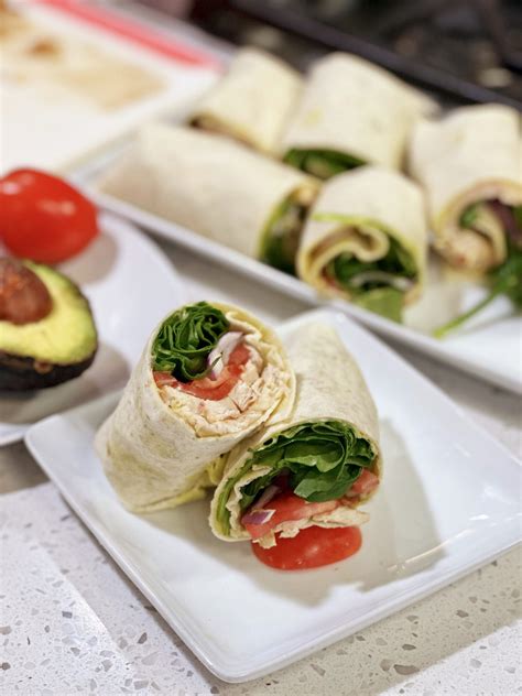 How does Grilled Chicken Wrap withApple Slices fit into your Daily Goals - calories, carbs, nutrition