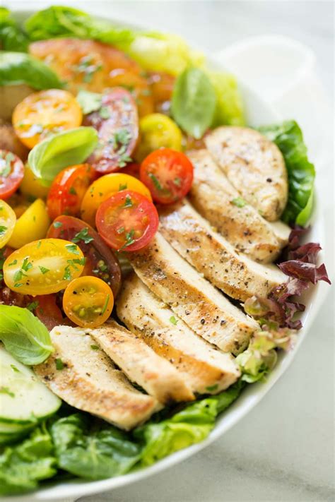 How does Grilled Chicken and Potatoes with Tomato and Cucumber Salad fit into your Daily Goals - calories, carbs, nutrition