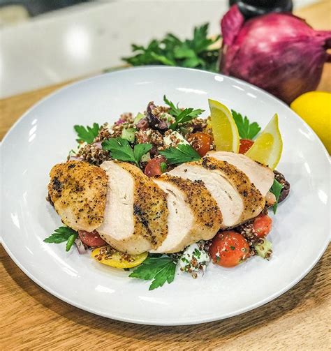 How does Grilled Chicken over Quinoa Salad with Tomatoes, Mint and Radish fit into your Daily Goals - calories, carbs, nutrition