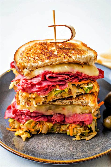 How does Grilled Corned Beef and Slaw Reuben fit into your Daily Goals - calories, carbs, nutrition